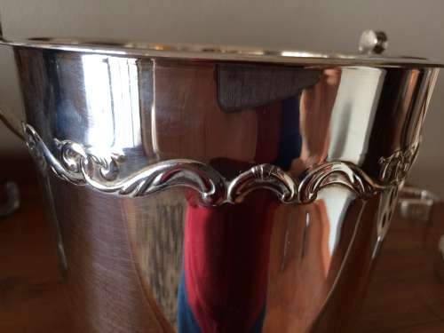 Silverplate ice bucket with strainer and tongs